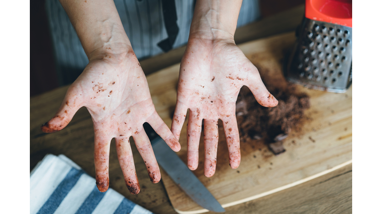 Dirty hands with chocolate
