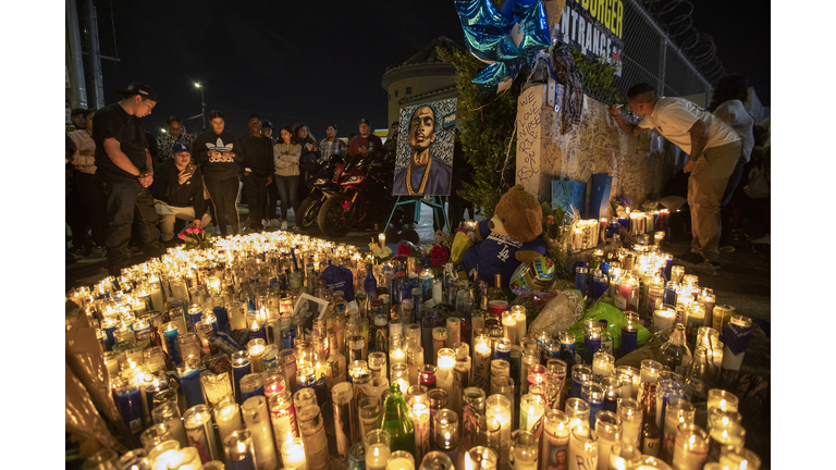 Fans Pay Respect At Scene Where Hip Hop Musician Nipsey Hussle Was Fatally Shot In Los Angeles