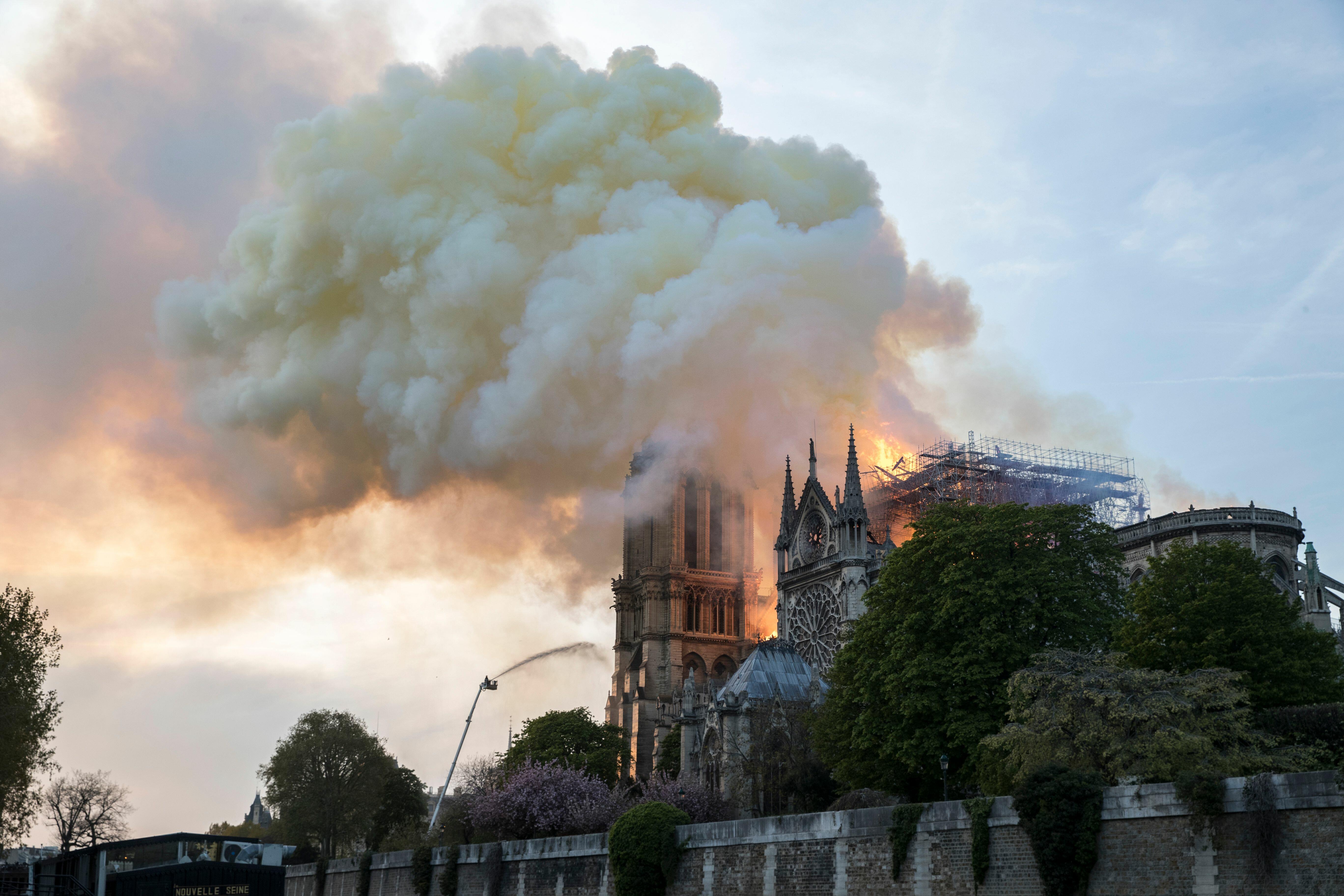 Parisians Sing Ave Maria Outside Of The Burning Notre-Dame in Paris - Thumbnail Image