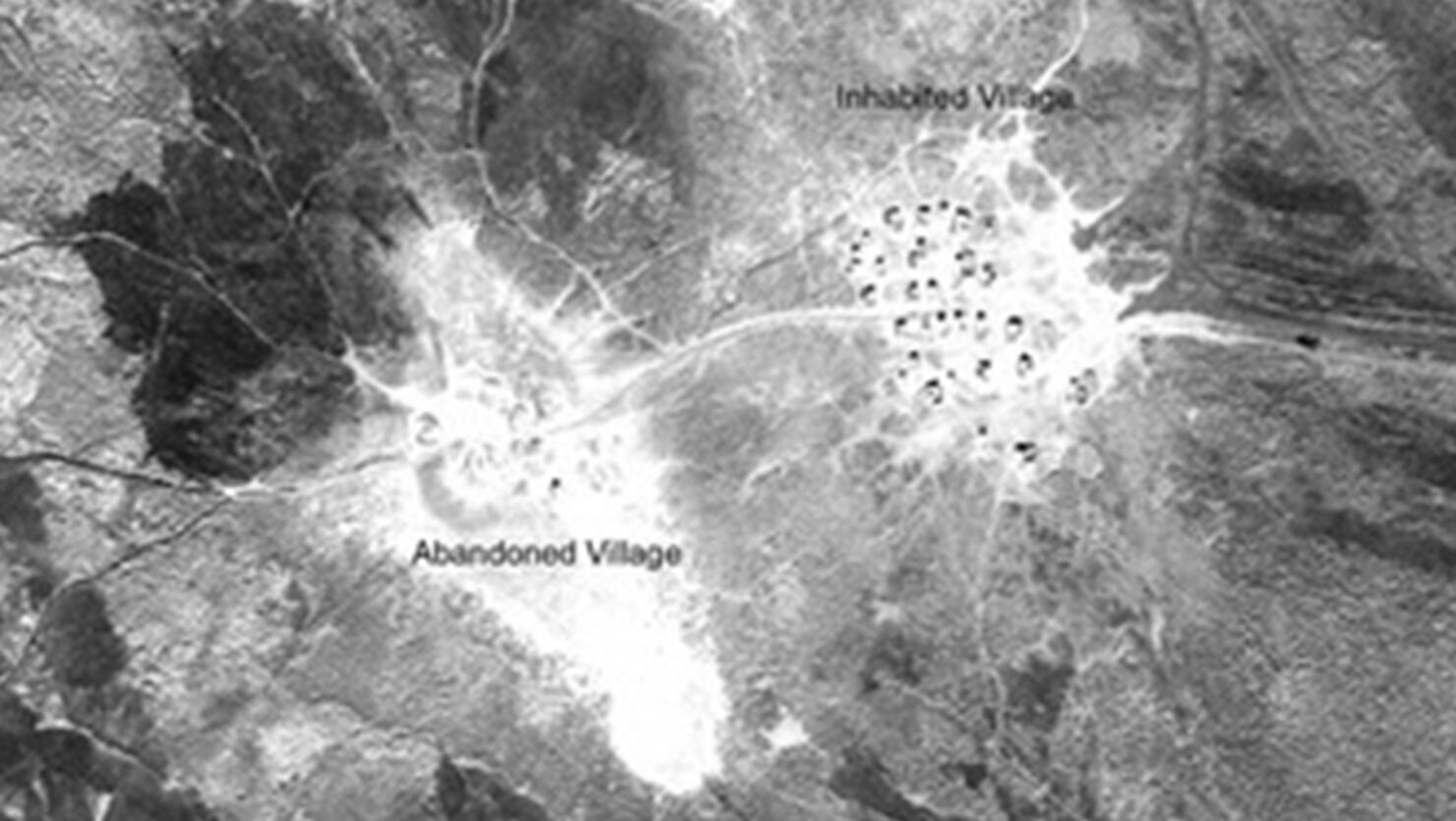 An inhabited and adjacent abandoned Marsh Arab village in the Central Marshes of southern Iraq, U2 mission 1554, January 1960 (Roll 10R, Frame 1284). 