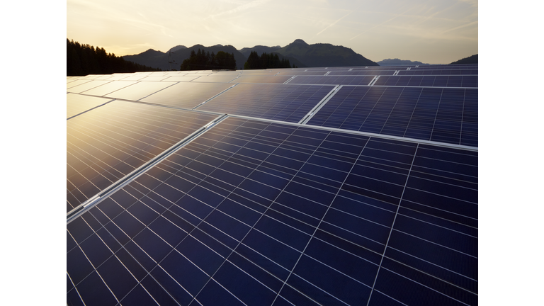 Austria, Tyrol, solar plant at evening twilight