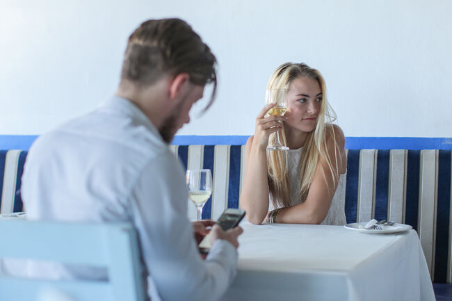 Texting while on a date.