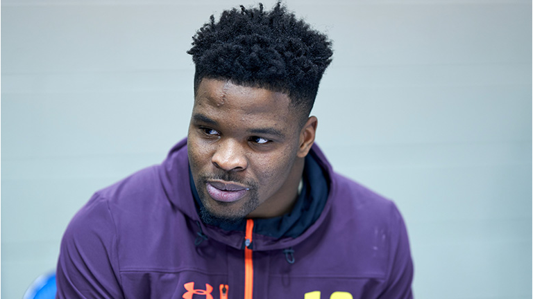 Arkansas linebacker Dre Greenlaw answers questions from the media during the NFL Scouting Combine