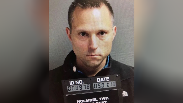 Pooperintendent sues police department who released his mugshot. 