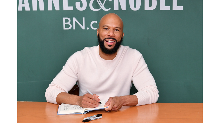 Common Signs Copies Of His New Book "Let Love Have The Last Word"