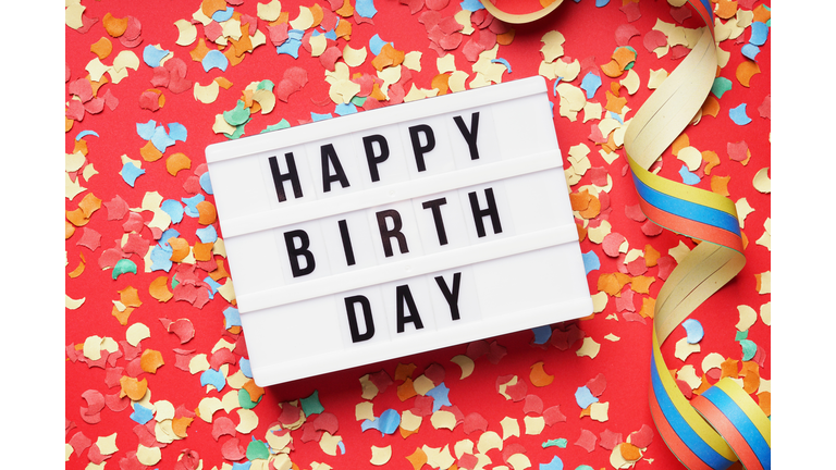 Directly Above Shot Of Soap With Happy Birthday Message On Confetti