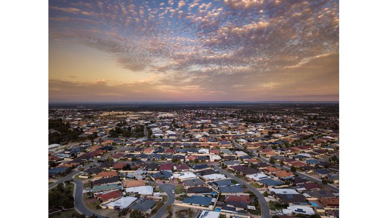 High Angle View Of Townscape Against Sky During Sunset