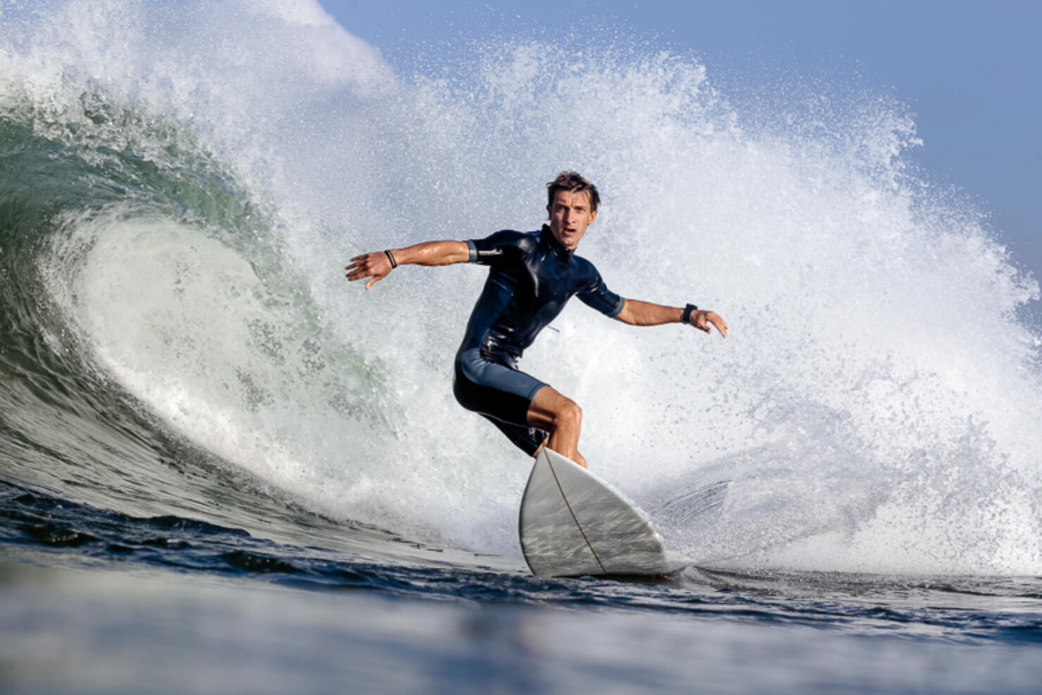 Low angle view of man surfing on sea