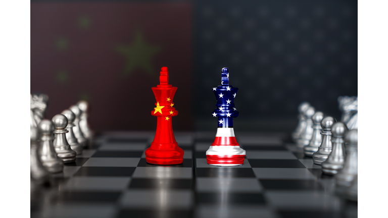 USA and China trade relations, cooperation strategy. US America and China flags on chess king on a chessboard.