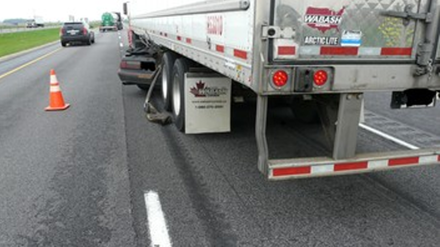 man driving mustang caught under moving semi-truck in Indiana