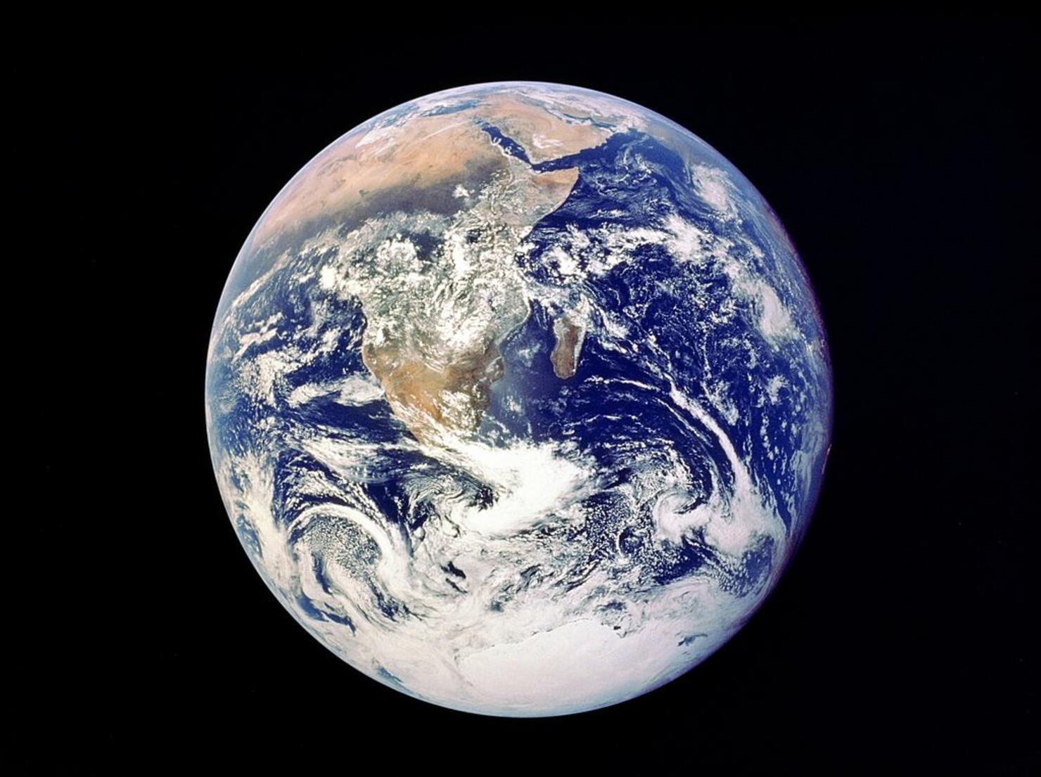 Whole Earth from space - view from Apollo 17 December 1972. First photograph of south polar ice cap. Most of Africa visible also Arabian Peninsular and Madagascar (Malagasy). NASA photograph. 