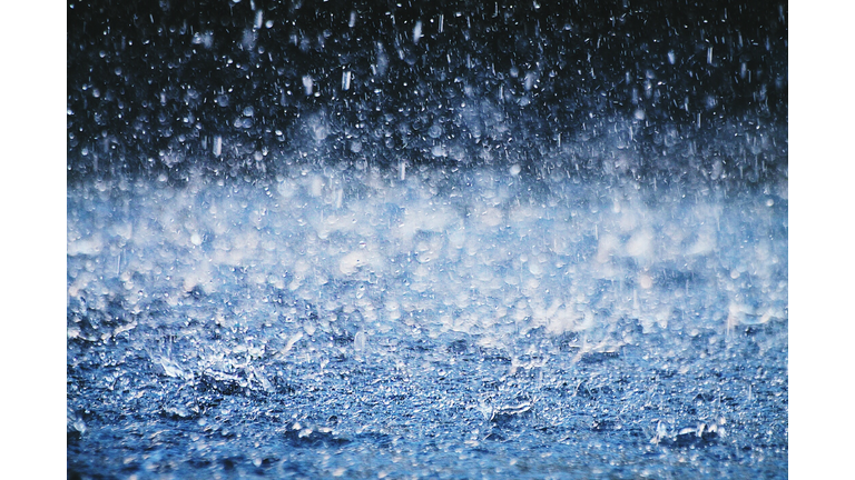 Torrential Rain Splashing On Footpath