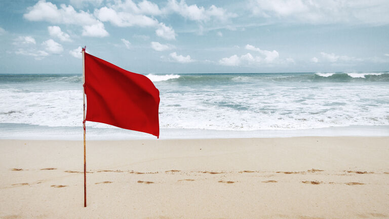 Red flag on beach