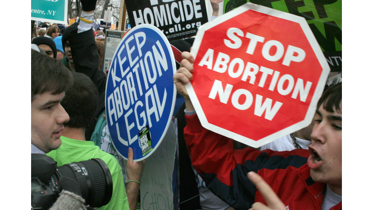 Pro-life demonstrators (R) confront pro-