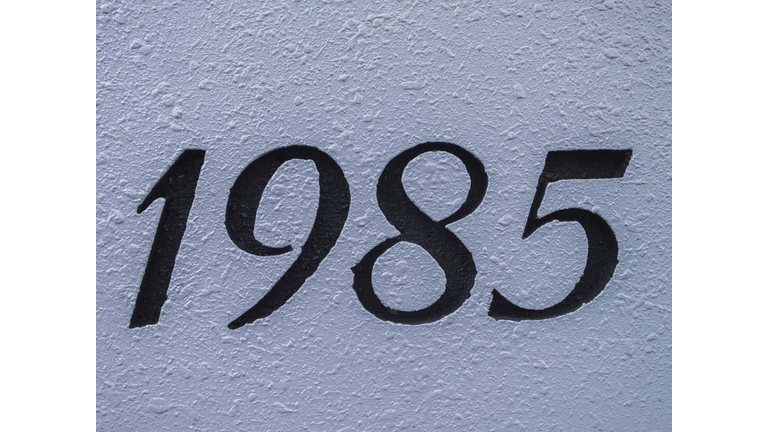 1985s imageCreated number on white wall