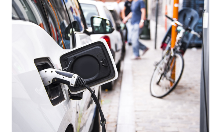 Electric car being charged