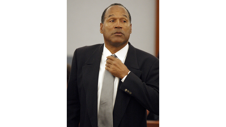 O.J. Simpson, left, and his attorney, Ya