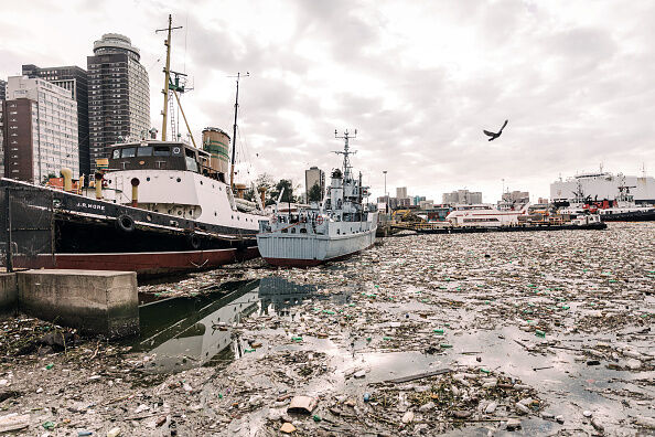 TOPSHOT-SAFRICA-ENVIRONMENT-WASTE-WEATHER-FLOOD