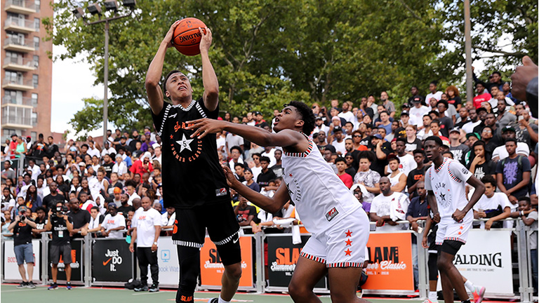 RJ Hampton #5 of Team Ramsey heads for the net as Josh Christopher #3 of Team Stanley defends during the SLAM Summer Classic 2018 at Dyckman Park on August 18, 2018 in New York City.