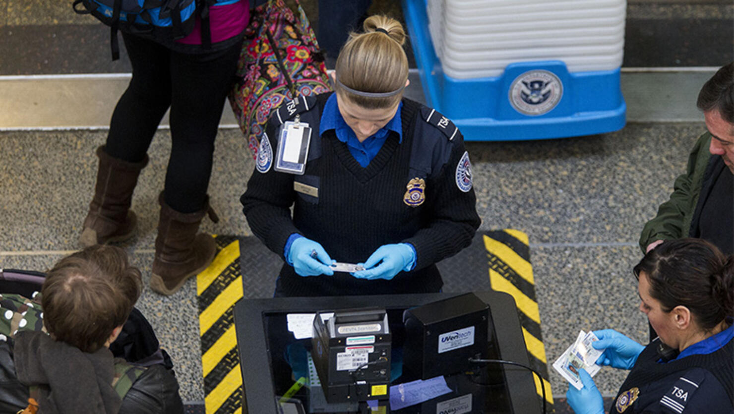 TSA Officers Work As Homeland Security Shutdown Nears Amid Immigration Impasse
