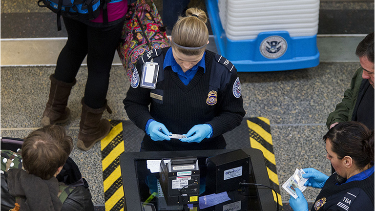 TSA Officers Work As Homeland Security Shutdown Nears Amid Immigration Impasse