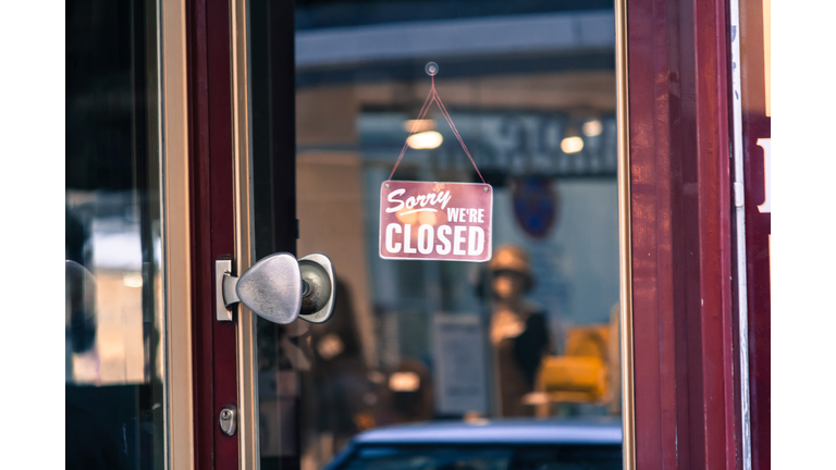 Close-Up Of Closed Sign At Store