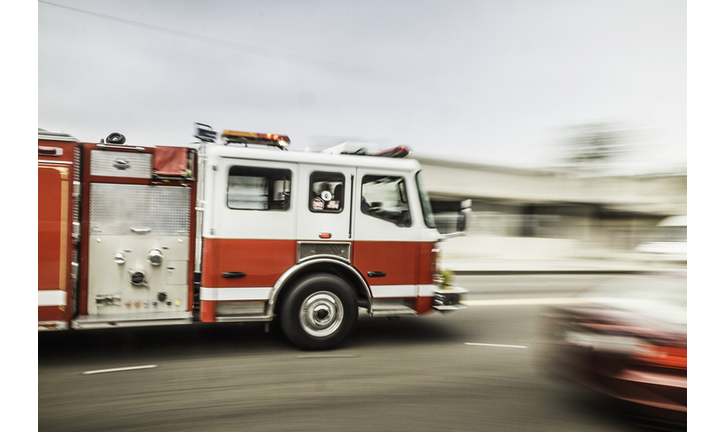 Blurred motion shot of speeding fire engine