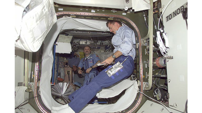 Shuttle Crew Installs Quest Airlock