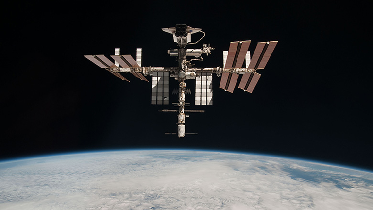 Endeavour Orbits Earth Docked To International Space Station