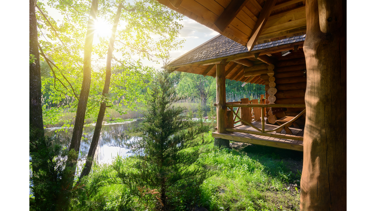 Wooden house and river