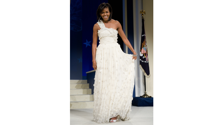First Lady Michelle Obama poses during t