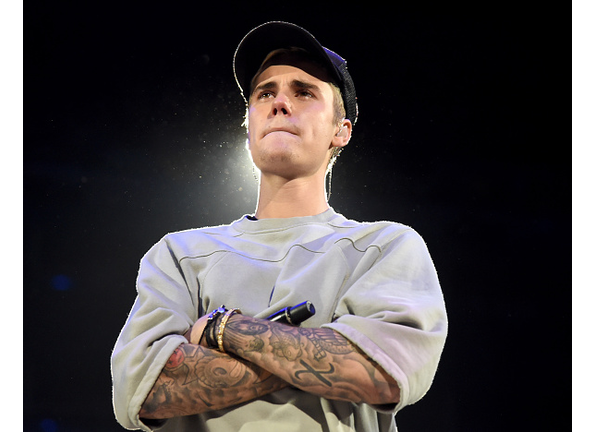 Was Justin Bieber kidding  about wanting to cage fight Tom Cruise?