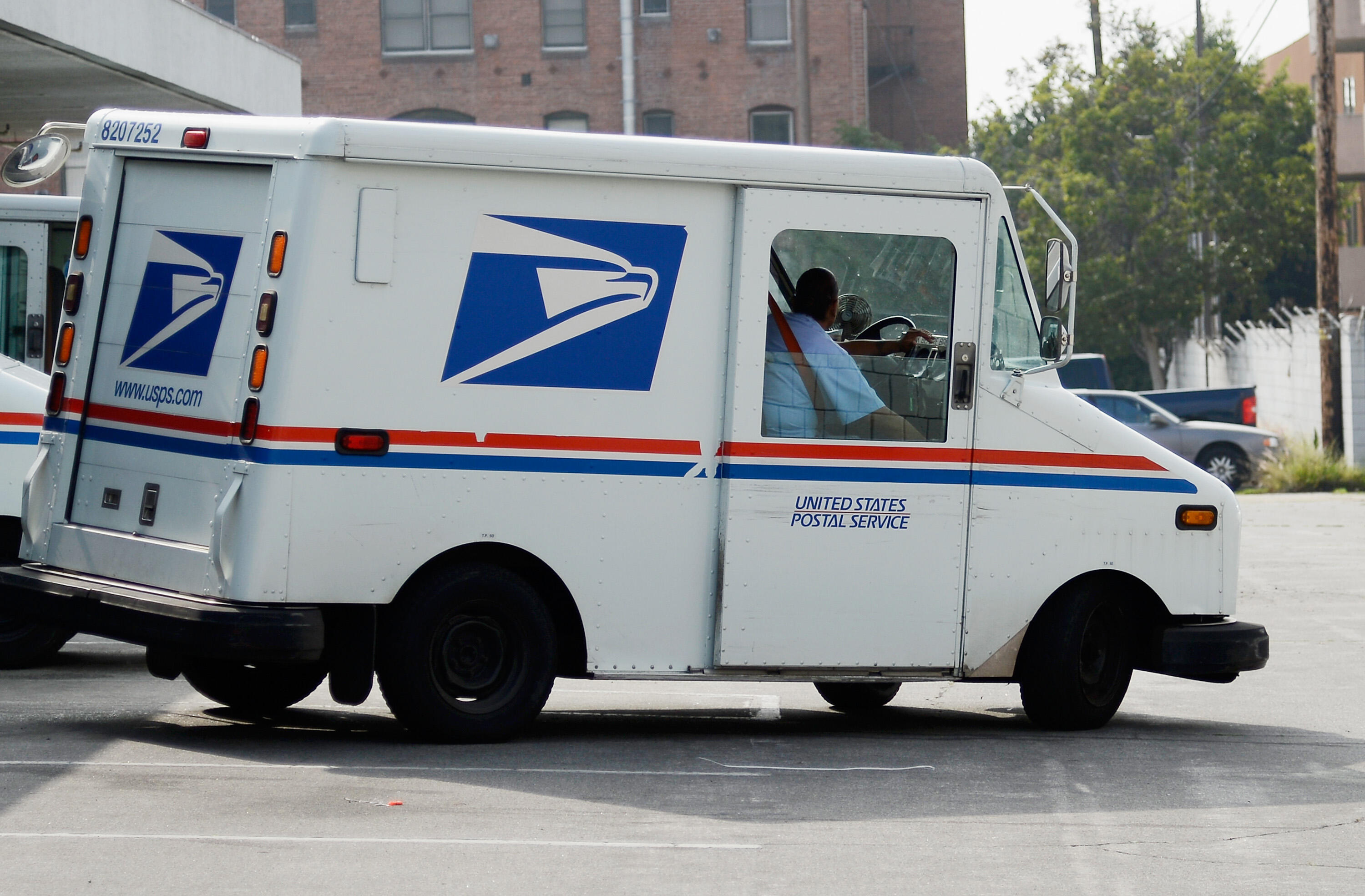 Postal Workers Caught on Camera Tossing Packages - Thumbnail Image