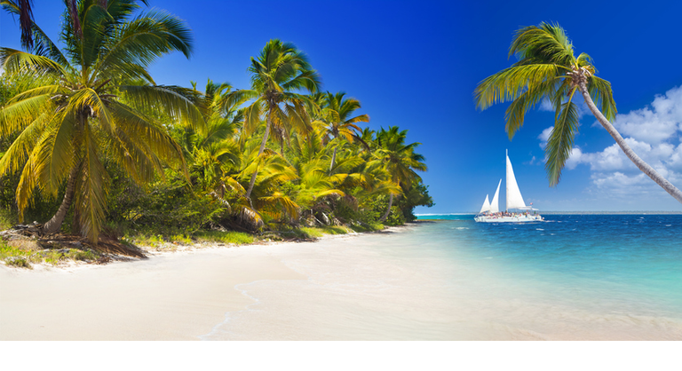 Tropical beach and sailing boat