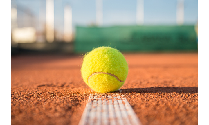 Close-Up Of Tennis Ball On Field