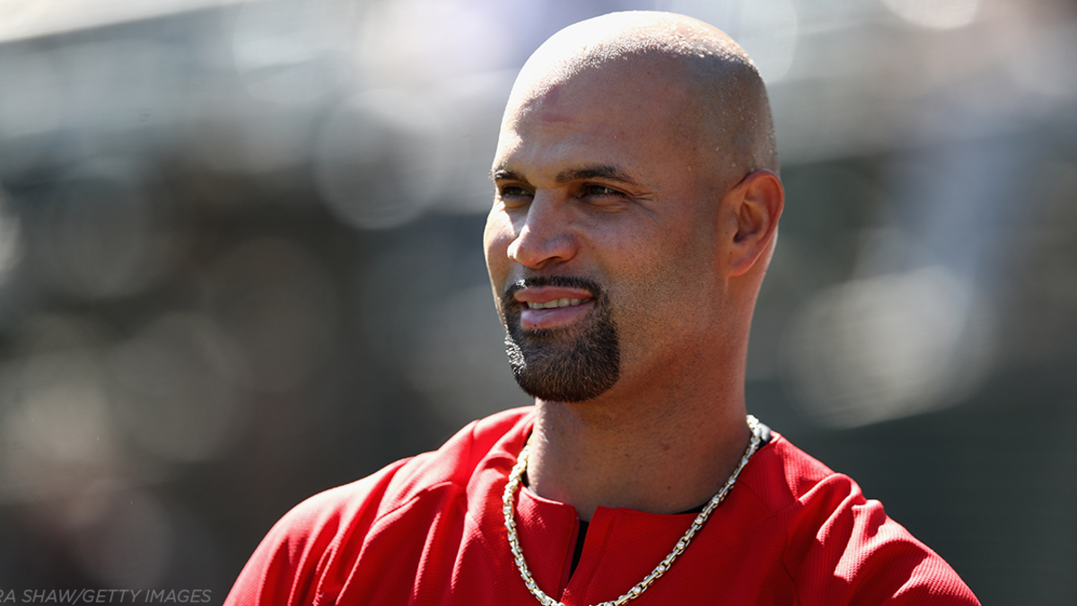 ALBERT PUJOLS GIVES JERSEY OFF HIS BACK TO FAN WITH