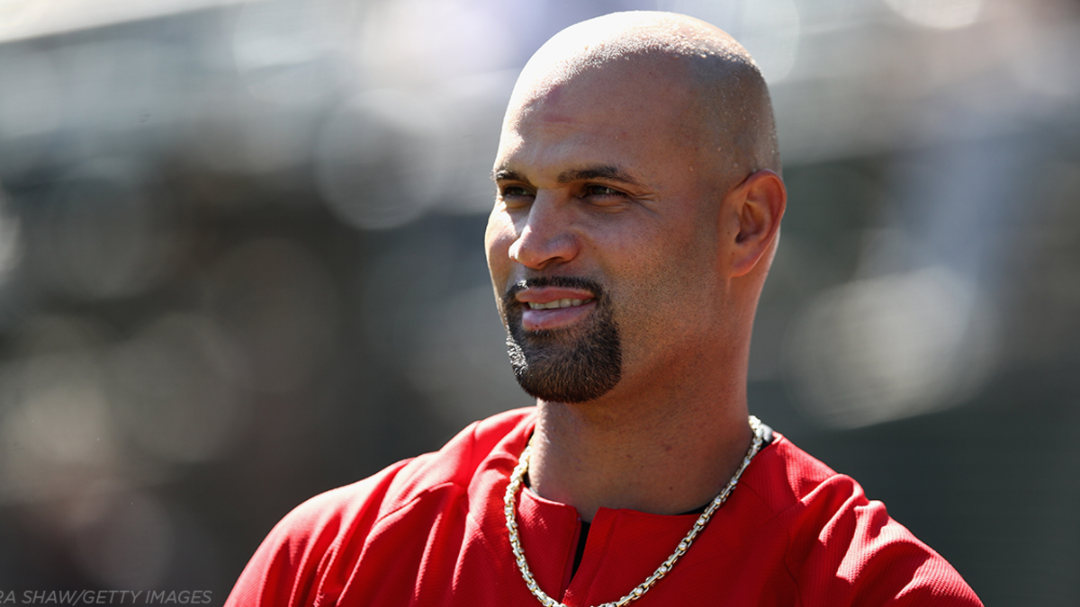 Albert Pujols gives 9yo with Down syndrome shirt off his back :  r/HumansBeingBros