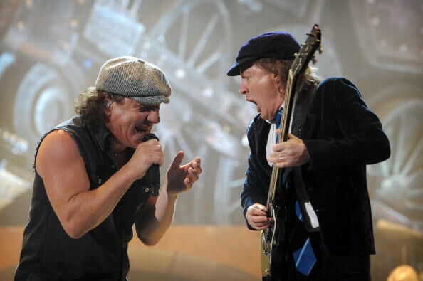 British singer Brian Johnson (L) and gui