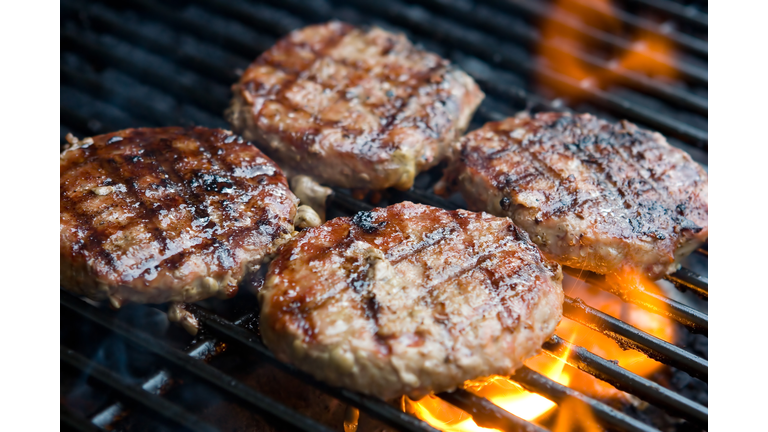 Hamburgers on the grill-getty images