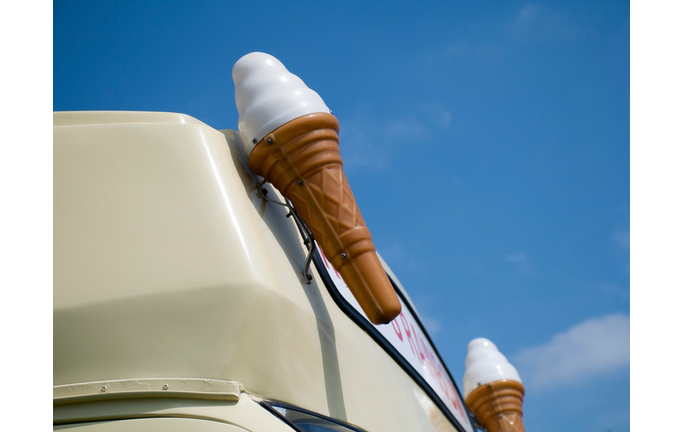 Low Angle View Of Artificial Ice Cream On Truck Against Sky
