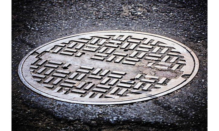 Manhole cover on street