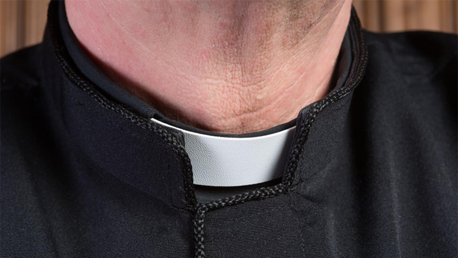 Priest clerical collar