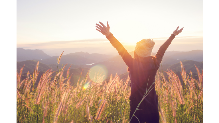 Happy Freedom in sunrise nature