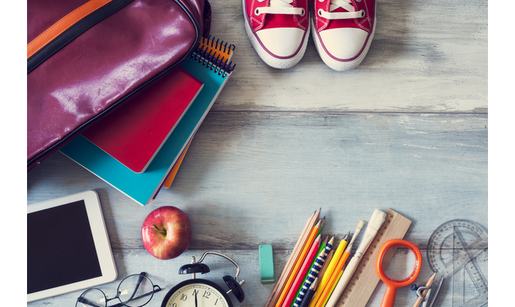School supplies on wooden background