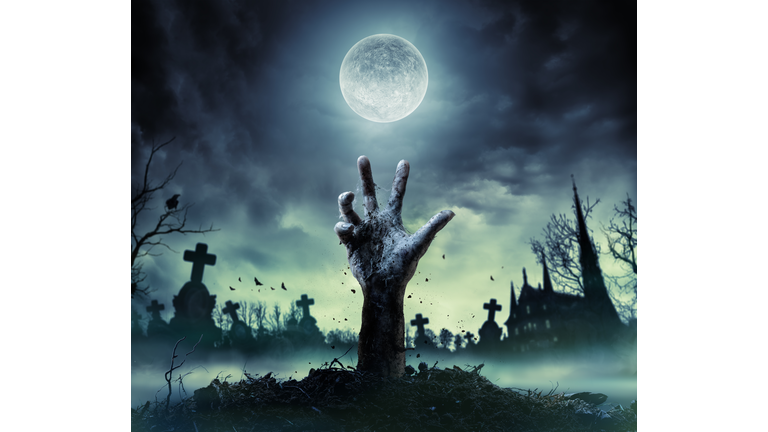 Zombie Hand Rising Out Of A Grave-getty images