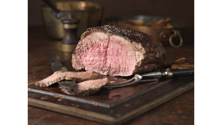 Christmas dinner. 28 day matured sirloin of beef served rare medium with roasted parsnips