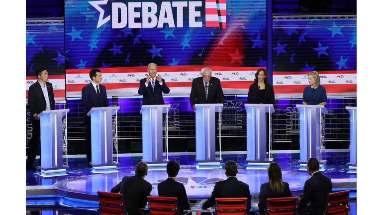 MIAMI, FLORIDA - JUNE 27: Democratic presidential candidates (L-R) former tech executive Andrew Yang, South Bend, Indiana Mayor Pete Buttigieg, former Vice President Joe Biden, Sen. Bernie Sanders (I-VT), Sen. Kamala Harris (D-CA) and Sen. Kirsten Gillibrand (D-NY) take part in the second night of the first Democratic presidential debate on June 27, 2019 in Miami, Florida. A field of 20 Democratic presidential candidates was split into two groups of 10 for the first debate of the 2020 election, taking place over two nights at Knight Concert Hall of the Adrienne Arsht Center for the Performing Arts of Miami-Dade County, hosted by NBC News, MSNBC, and Telemundo. (Photo by Drew Angerer/Getty Images)