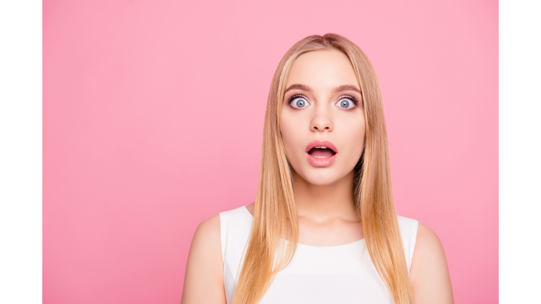 Black Friday concept! Close up portrait of charming crazy mad astonished amazed excited cheerful joyful with big gray eyes plump natural lips with pink pomade on them isolated on pink background