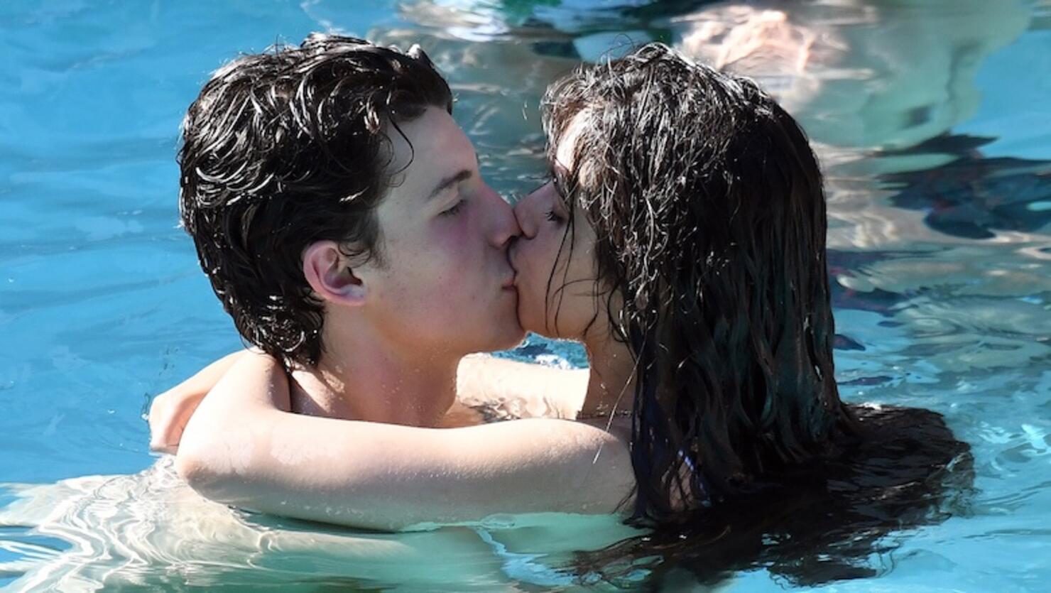 Camila Cabello and boyfriend Shawn Mendes can't keep their hand, or their lips, off each other as they make out in the pool in Miami