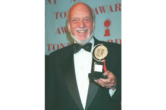 Harold Prince poses for photographers with his Ton